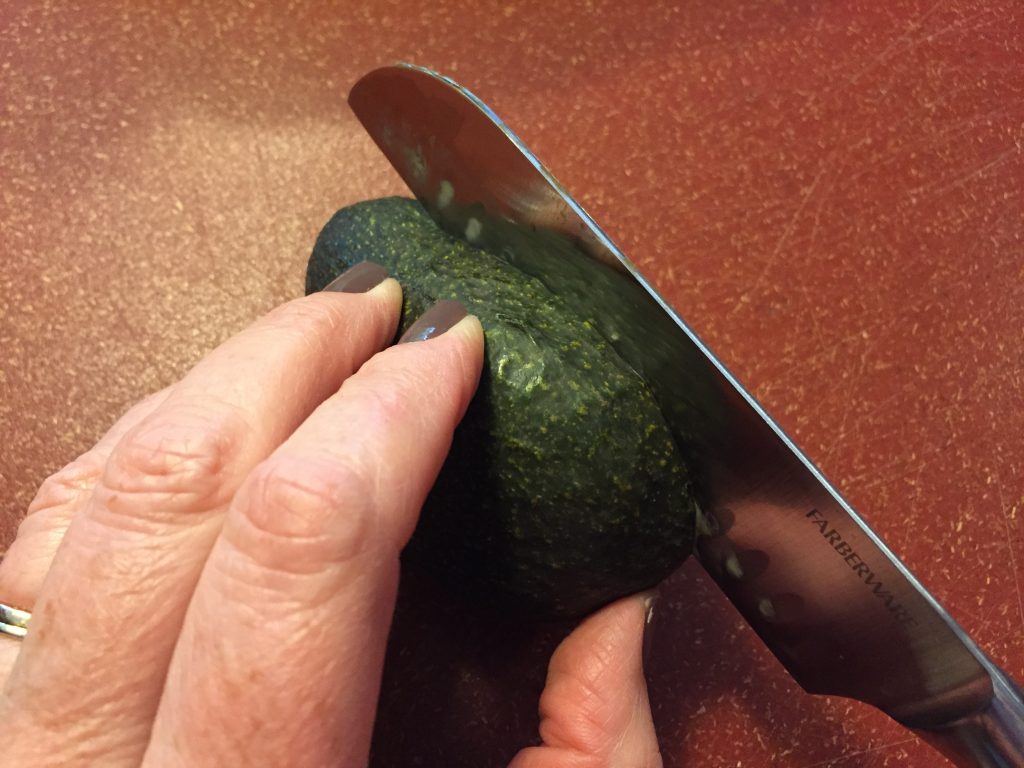 remove the avocado seed