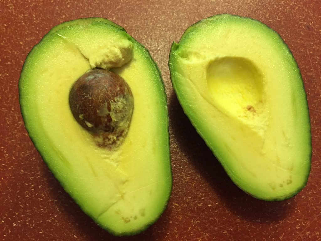 slicing a fresh avocado