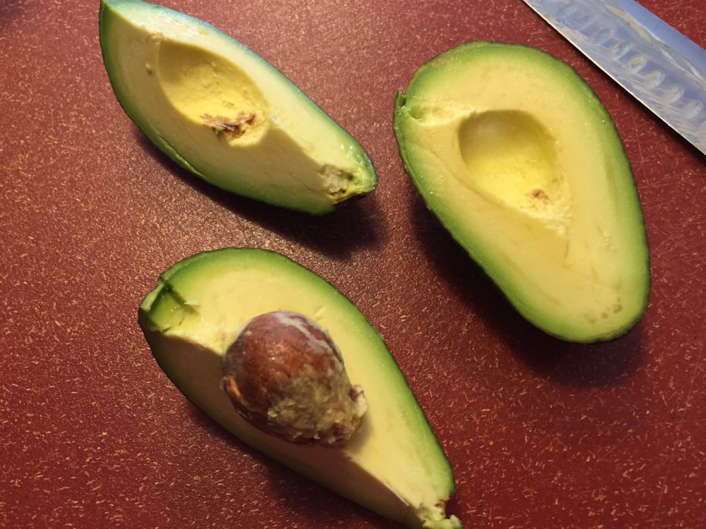 cut avocado into quarters