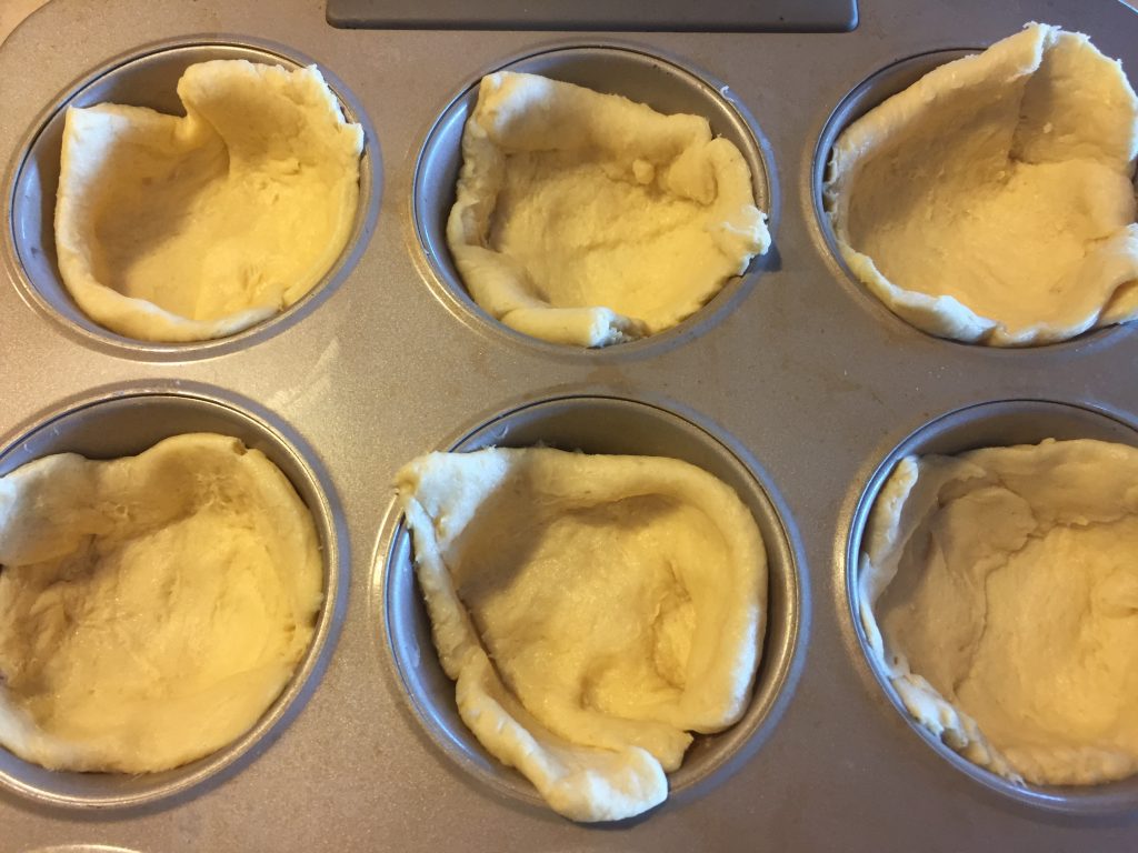 crescent dough in muffin tins