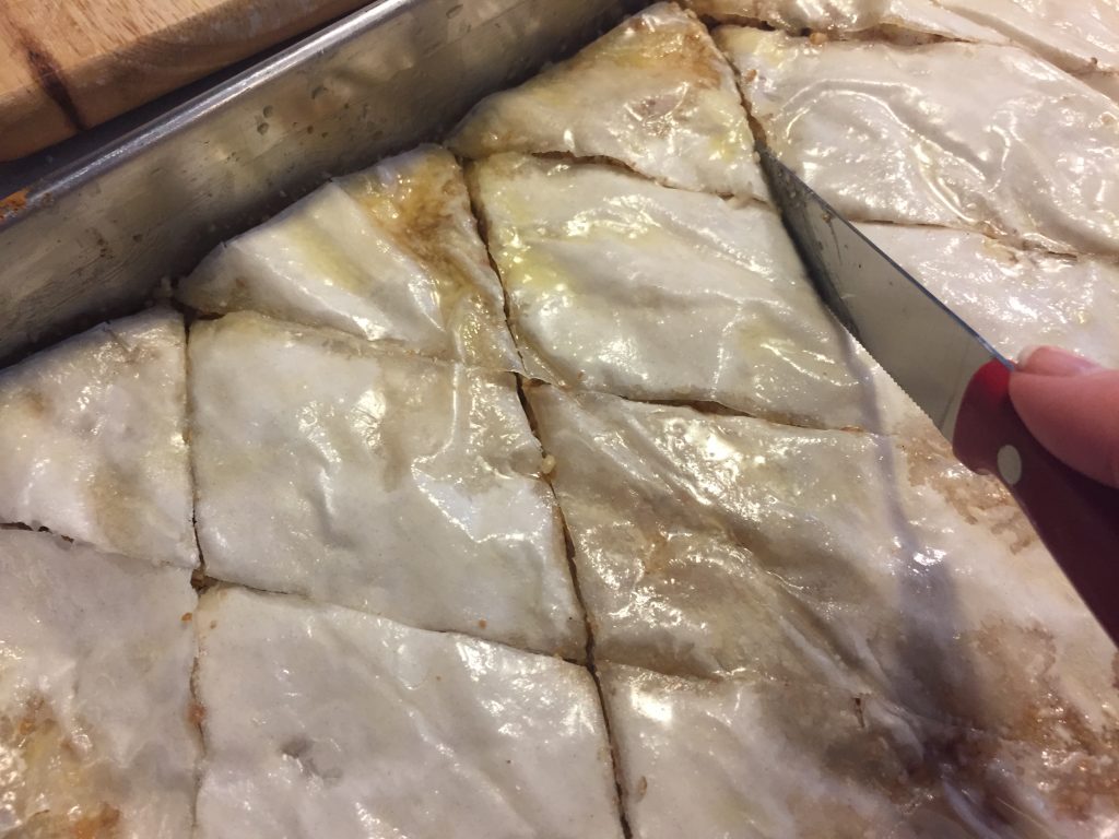 Slice the baklava.