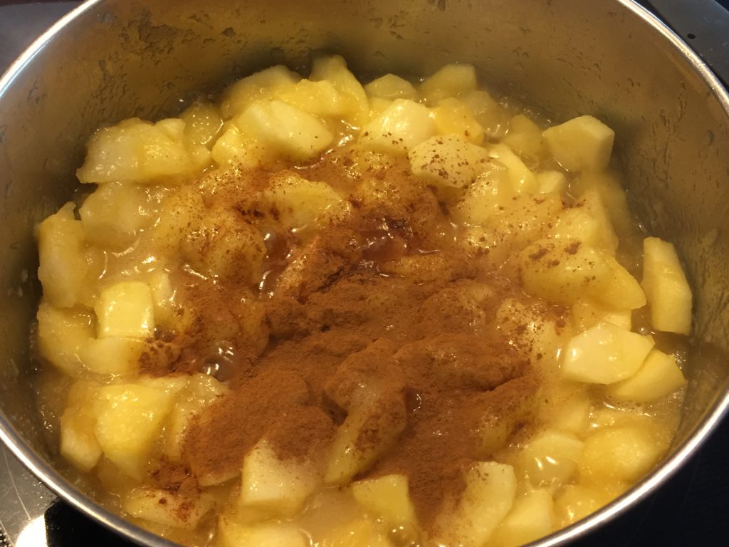 Add the cinnamon to the applesauce.