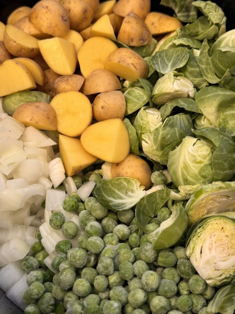 potatoes, brussels sprouts, onion and peas