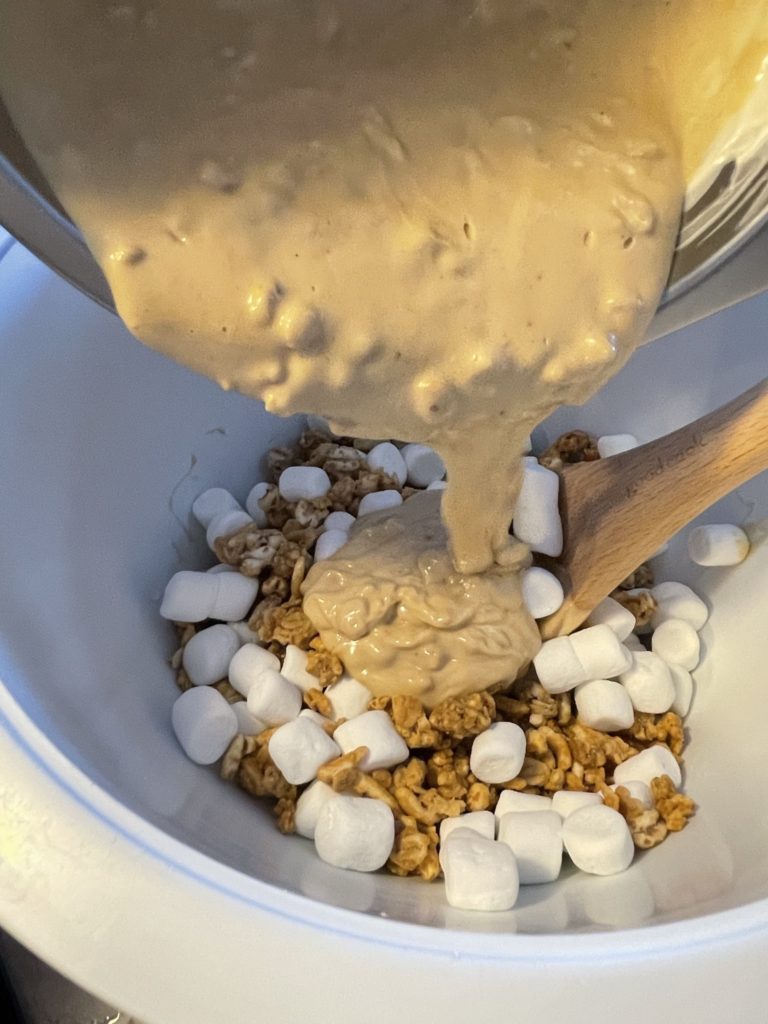 Making Peanut Butter Crunch Cookies.