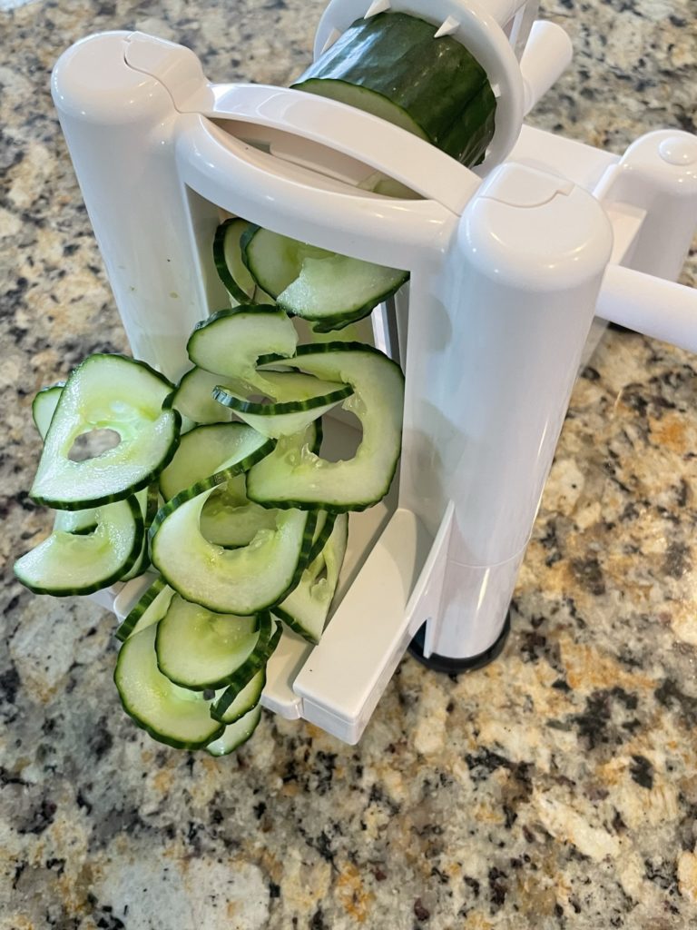 spiralizer cuts a cucumber