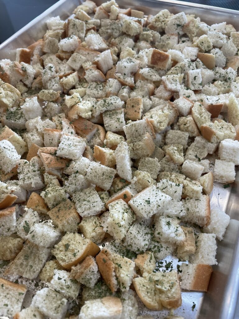 cubed bread and herbs