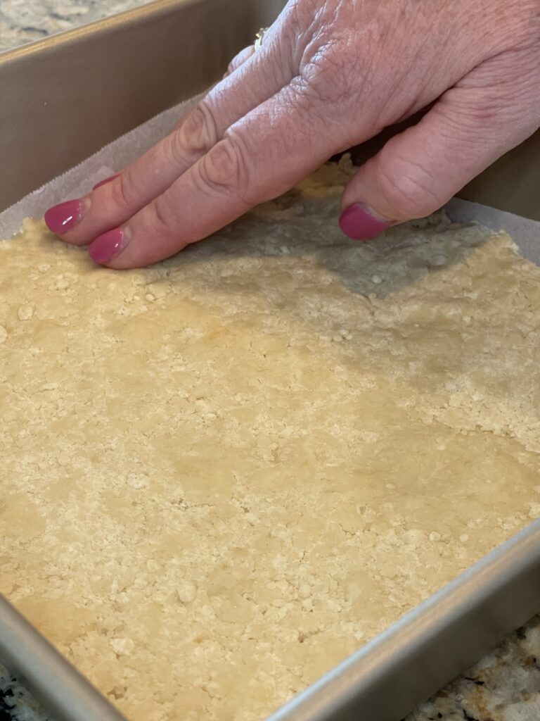 Making the shortbread crust.