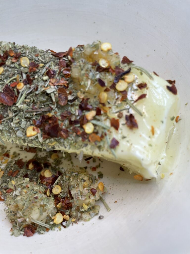 Add spices and herbs to softened butter to make Herbed Butter.