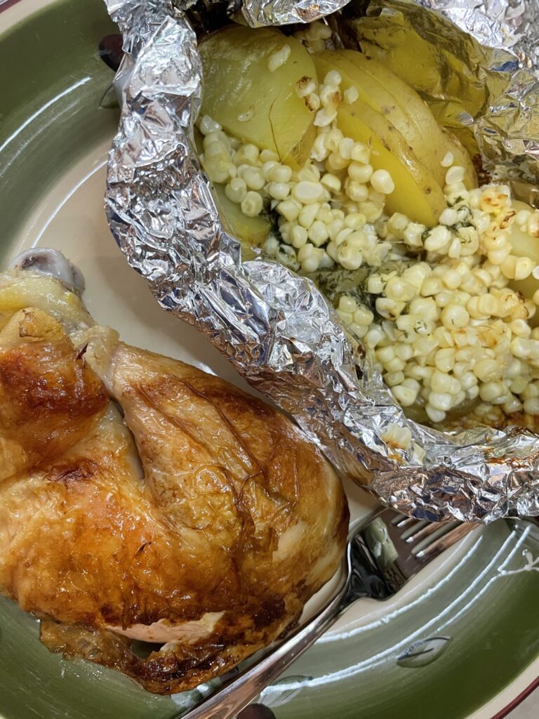 Herbed Butter on Grilled Potatoes and Corn.